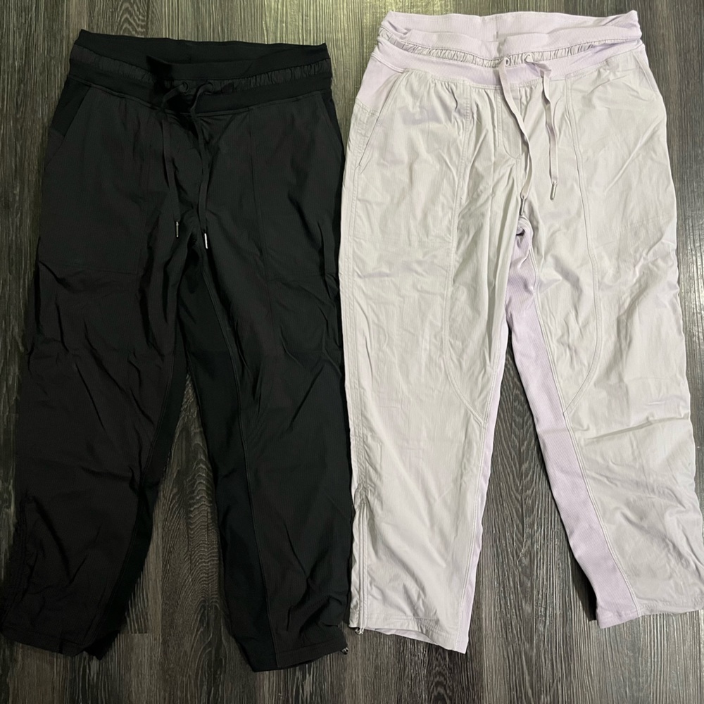 Two pairs of Dance Studio Crop pants from lululemon (black and lavender (lined))